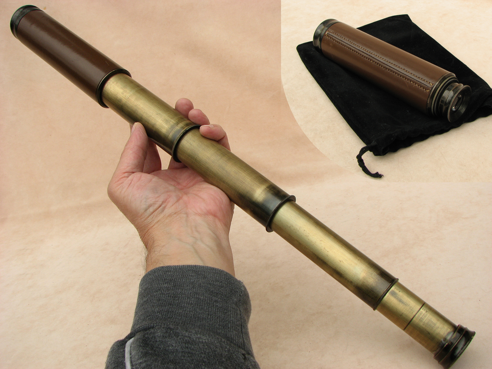 3 draw leather clad pocket telescope with pancratic tube to 20x magnification.